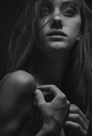 The author's "casting" for Lena, Shea's beloved sister. A woman with a resolute look and hair on her face.